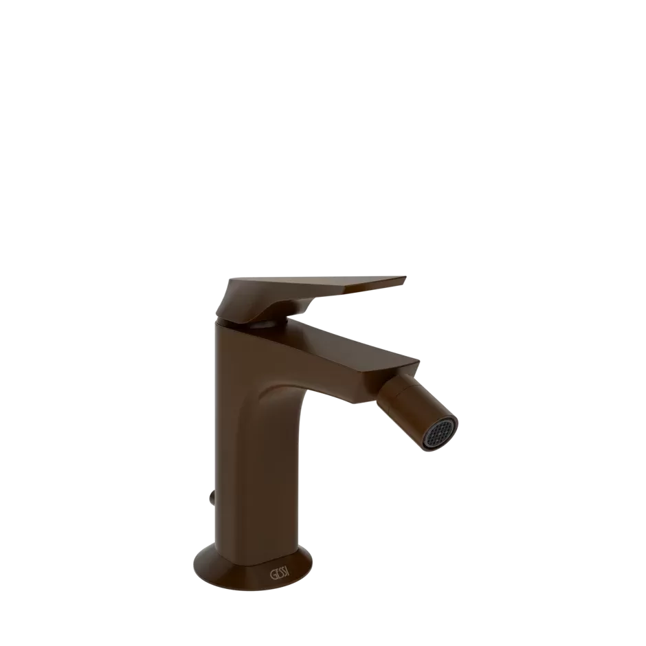 Смеситель для биде со сливом и соединительными патрубками.