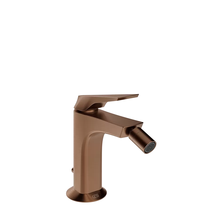 Смеситель для биде со сливом и соединительными патрубками.